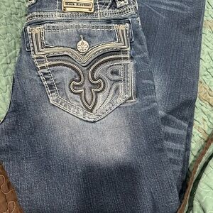 Rock Revival mens  Denim jeans with Embroidered Pockets, waist 33” length  28”